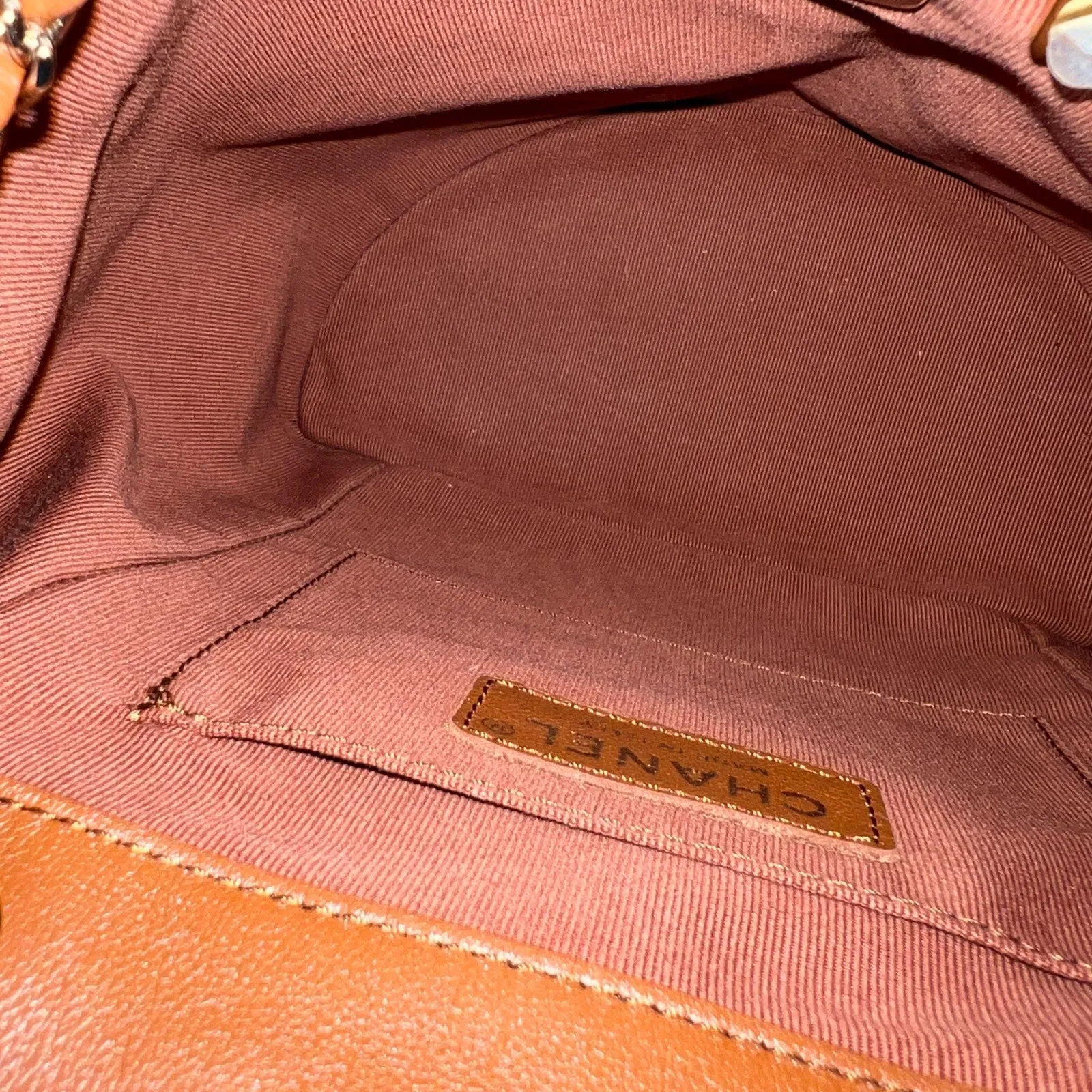 Chanel Medium Triple Backpack in 23A Cognac Brown Calfskin and LGHW (Model: AS3860)