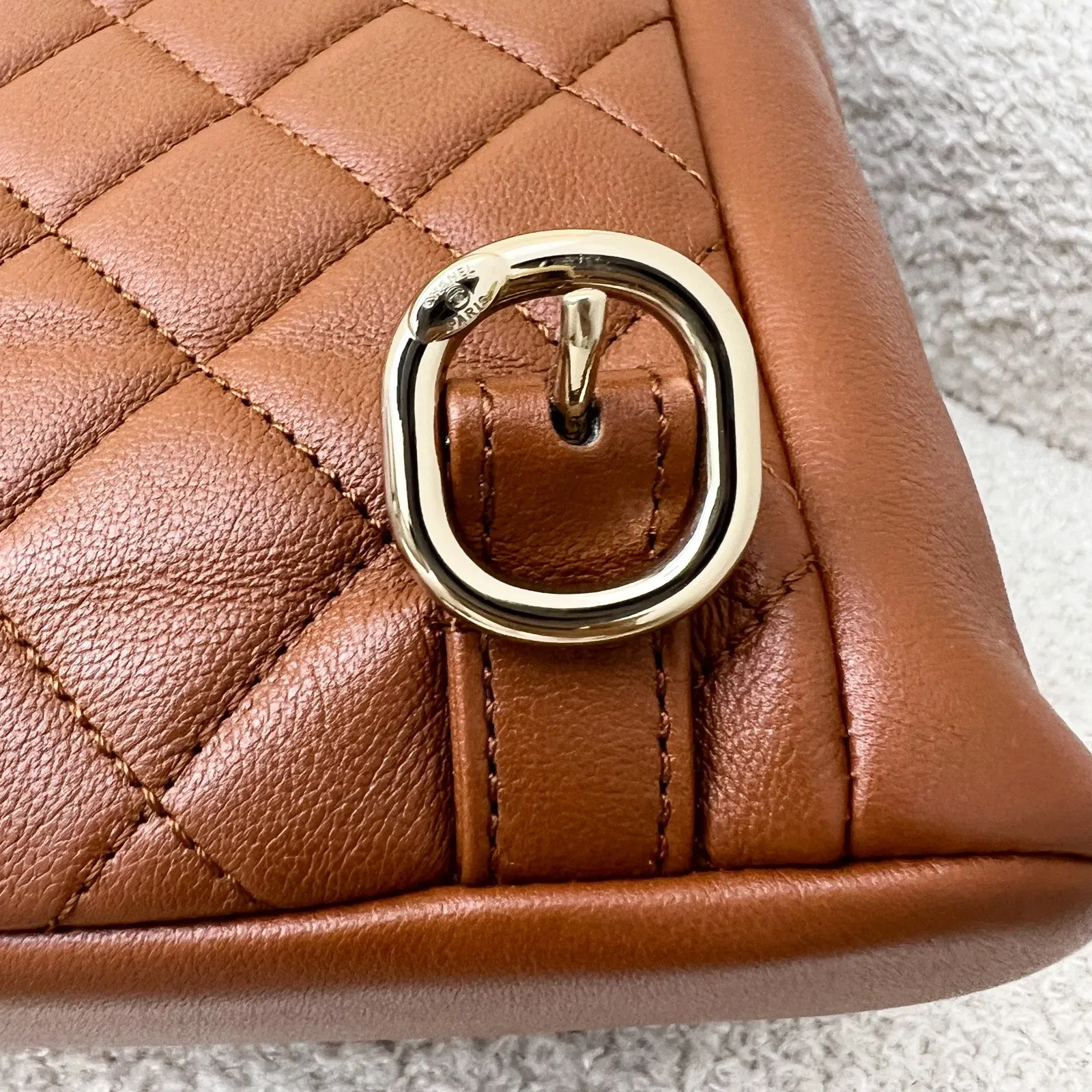 Chanel Medium Triple Backpack in 23A Cognac Brown Calfskin and LGHW (Model: AS3860)