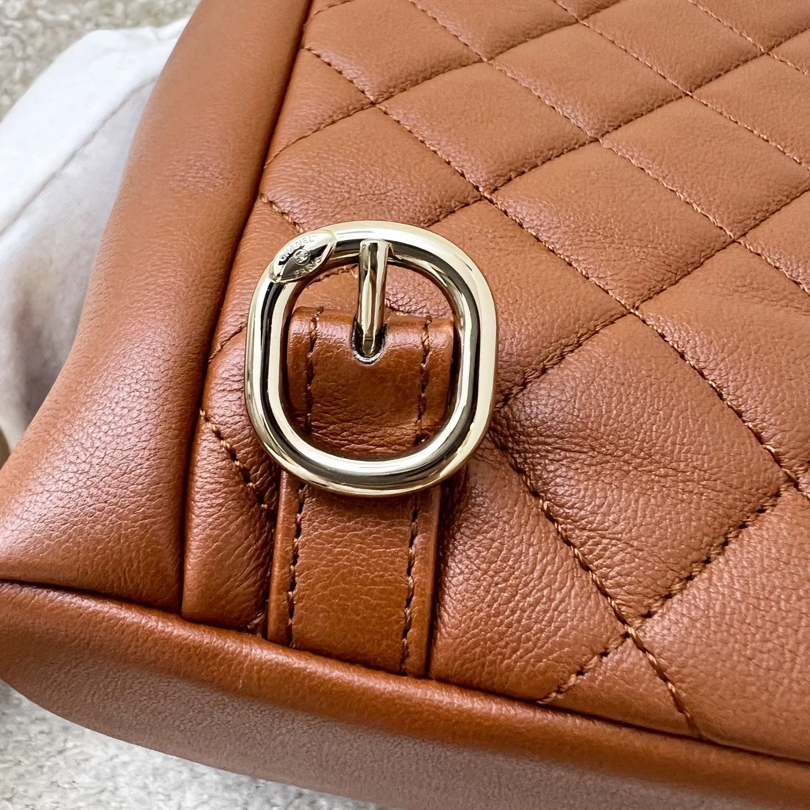 Chanel Medium Triple Backpack in 23A Cognac Brown Calfskin and LGHW (Model: AS3860)