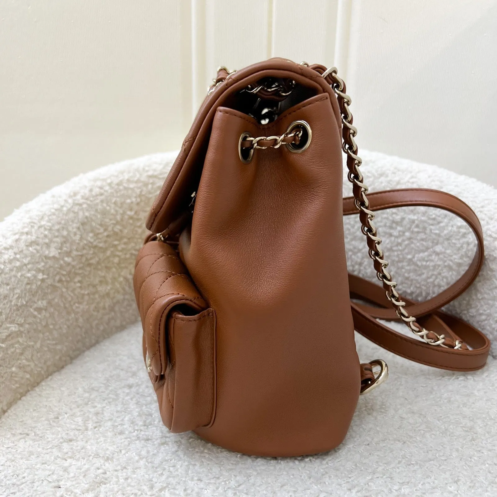 Chanel Medium Triple Backpack in 23A Cognac Brown Calfskin and LGHW (Model: AS3860)