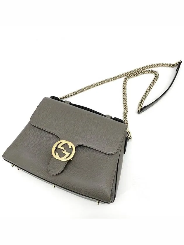 Interlocking top handle shoulder bag