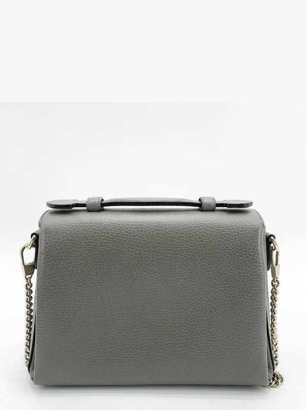 Interlocking top handle shoulder bag