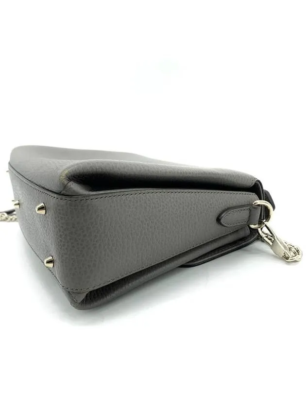 Interlocking top handle shoulder bag
