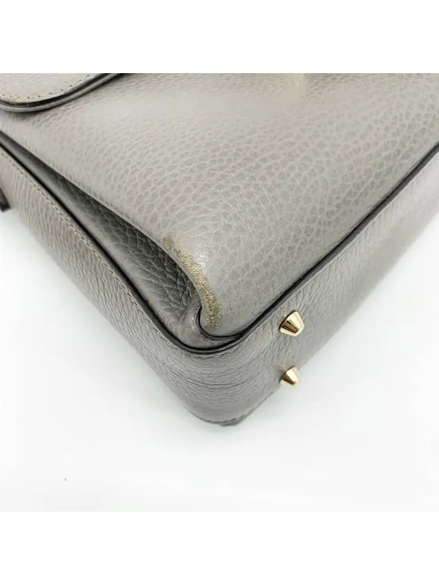 Interlocking top handle shoulder bag