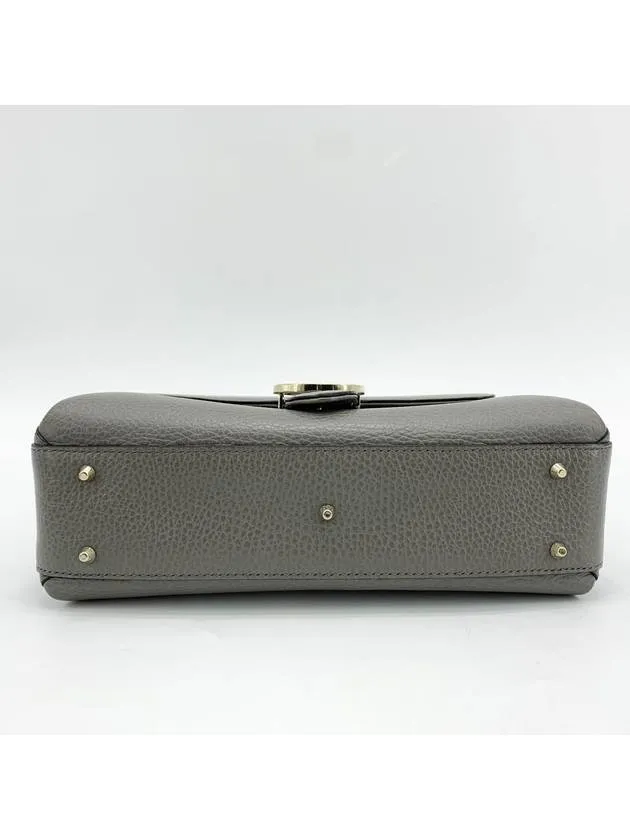 Interlocking top handle shoulder bag