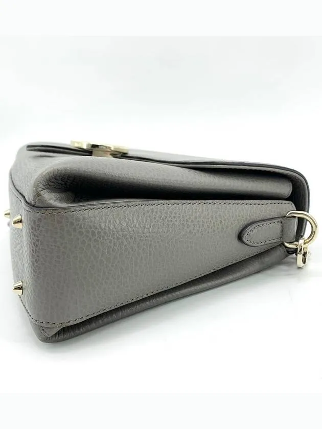 Interlocking top handle shoulder bag