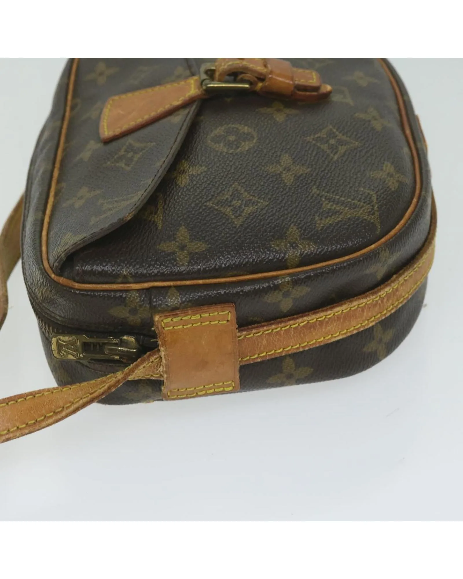 Monogram Canvas Shoulder Bag with Adjustable Strap and Multiple Compartments