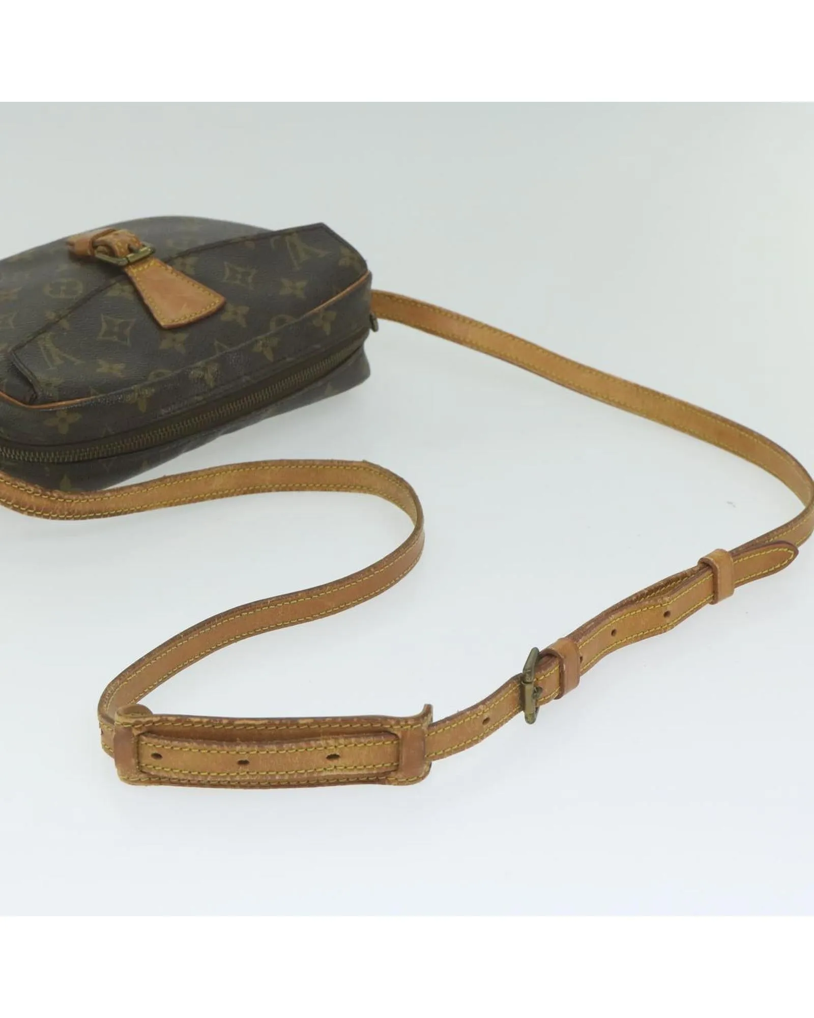 Monogram Canvas Shoulder Bag with Adjustable Strap and Multiple Compartments