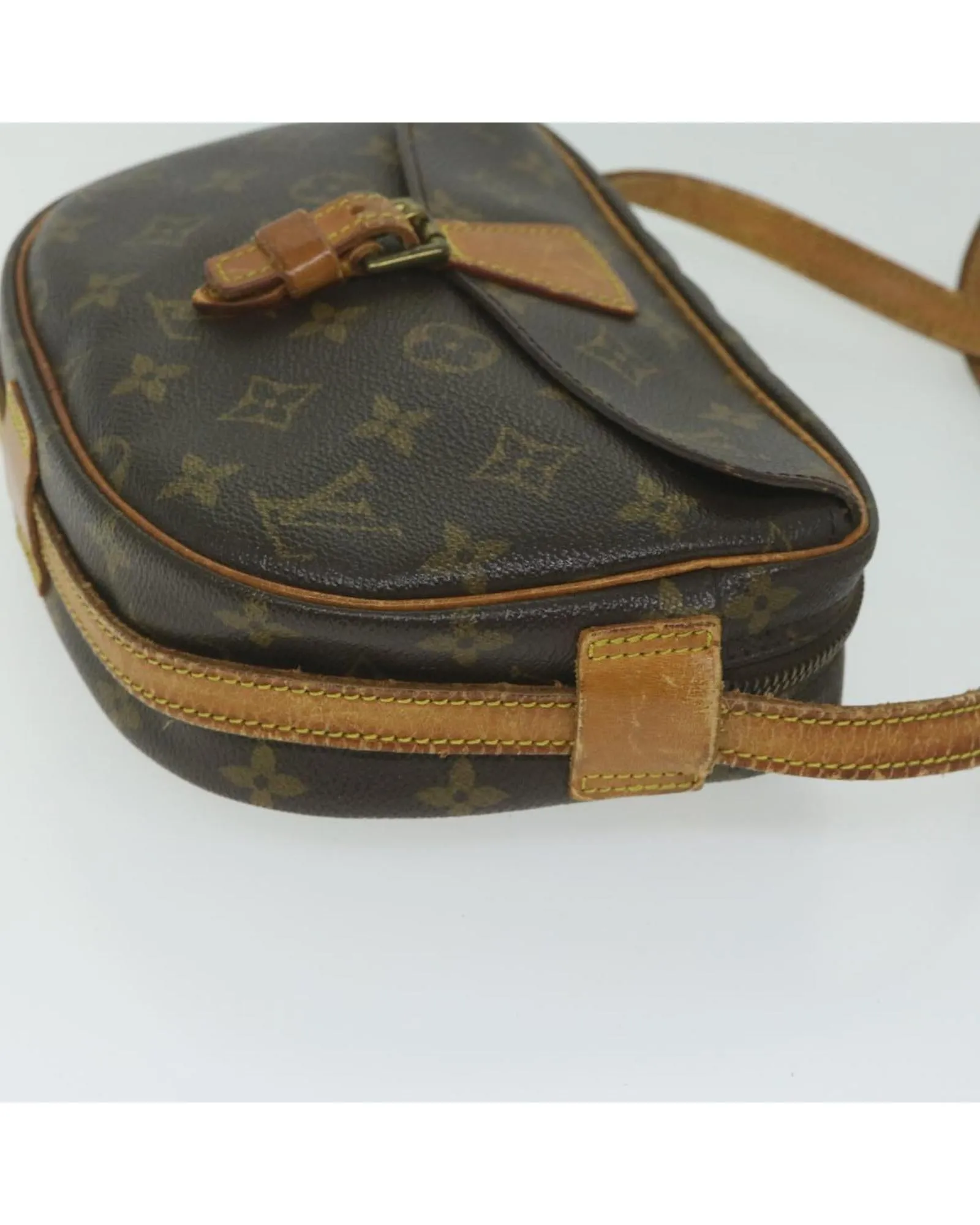 Monogram Canvas Shoulder Bag with Adjustable Strap and Multiple Compartments