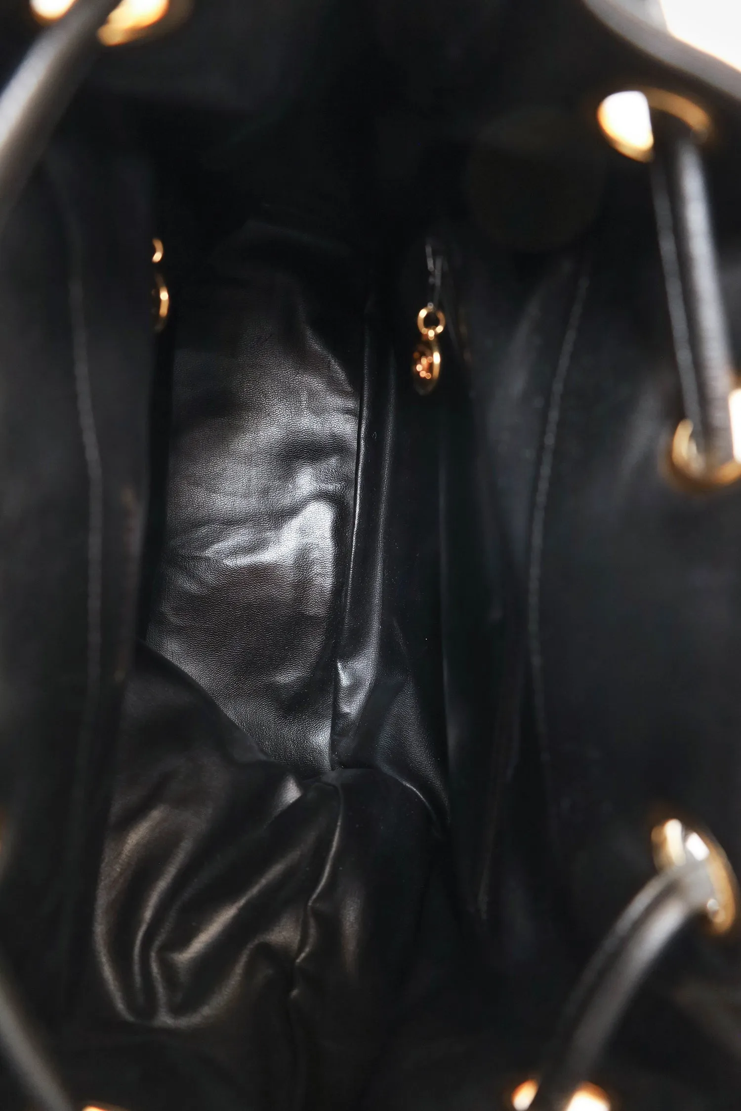 Pre-Loved Chanel Black Quilted Lambskin Drawstring Backpack